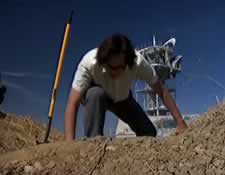 Nelson Franklin digging up a dead body in the new movie Ghost Phone