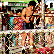 WITNESS: Beach hunks maniacally muscling!