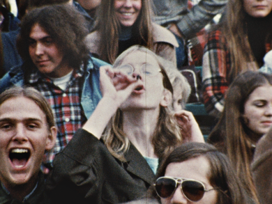 Teen Smoking Joint in Crowd